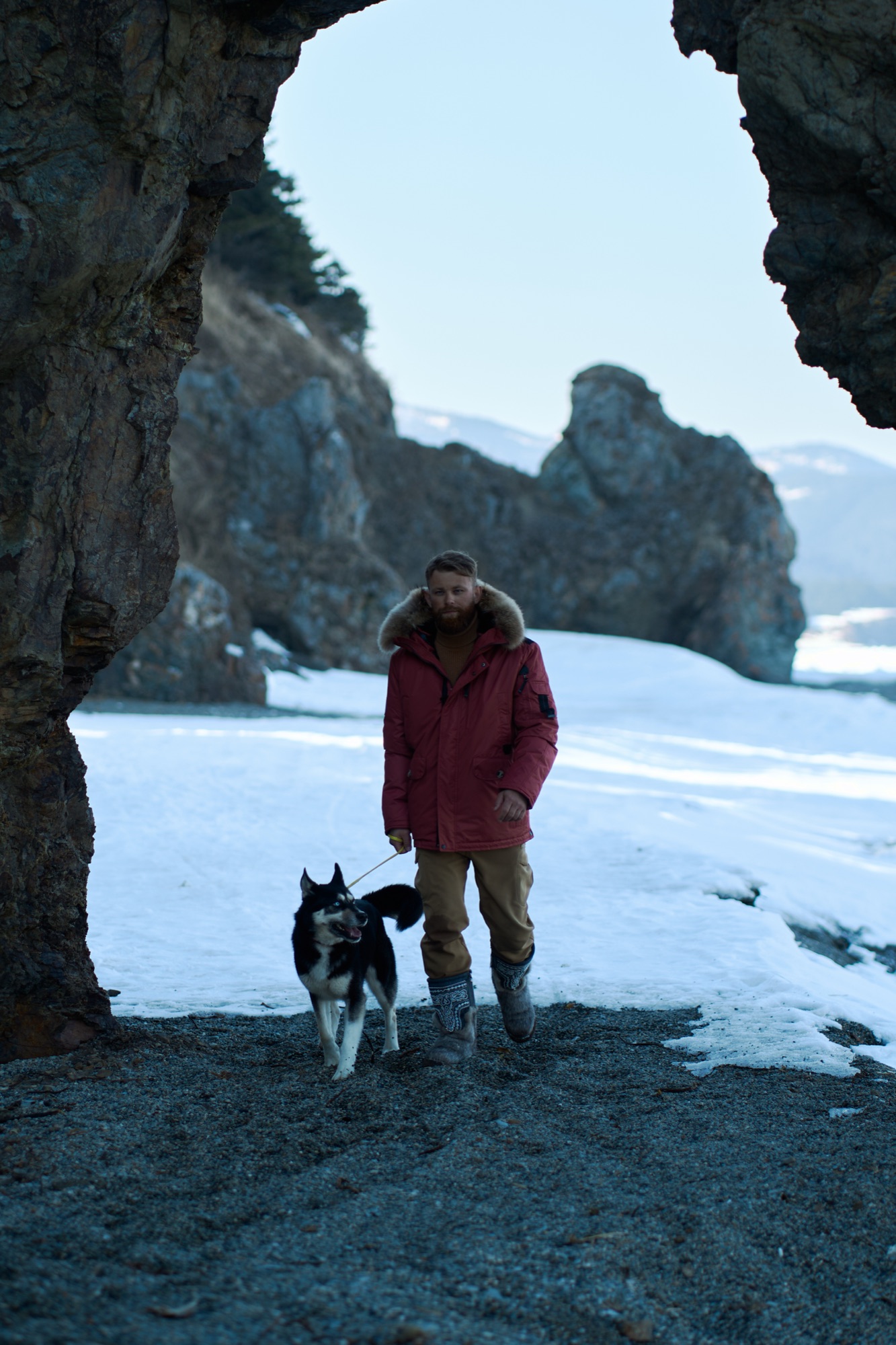 Men's collection — explorer with a husky